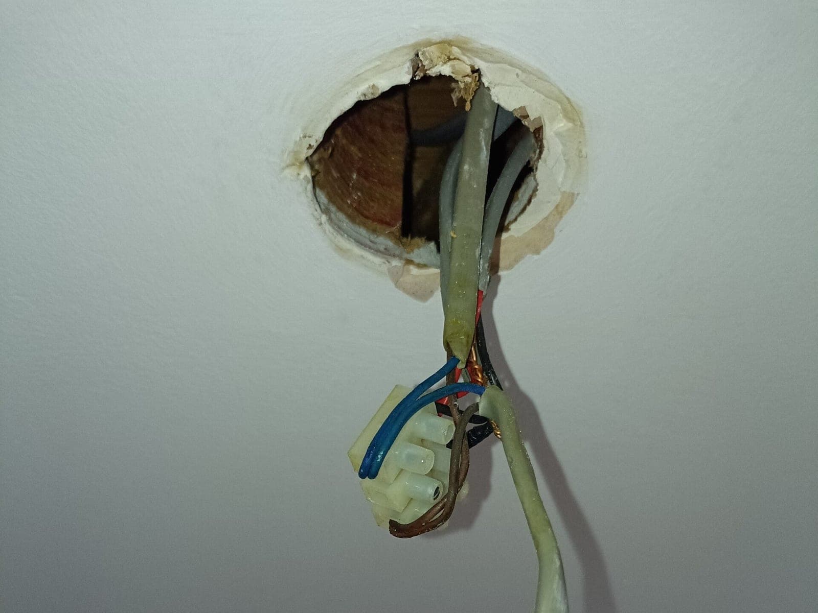 Old ceiling light wiring opened up, ready for a new light fitting
